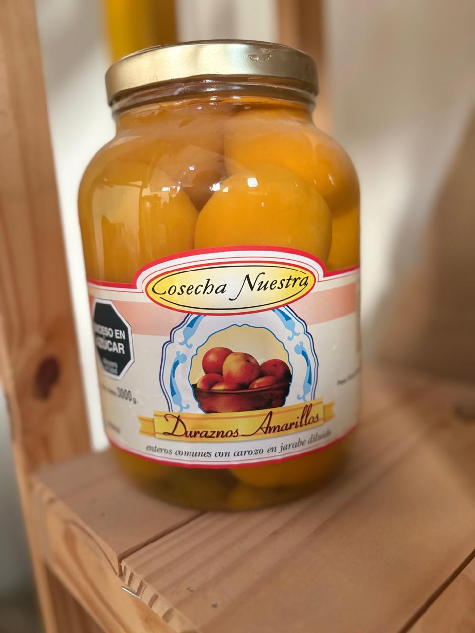 Duraznos amarillos en mitades comunes en jarabe concentrado 3kg