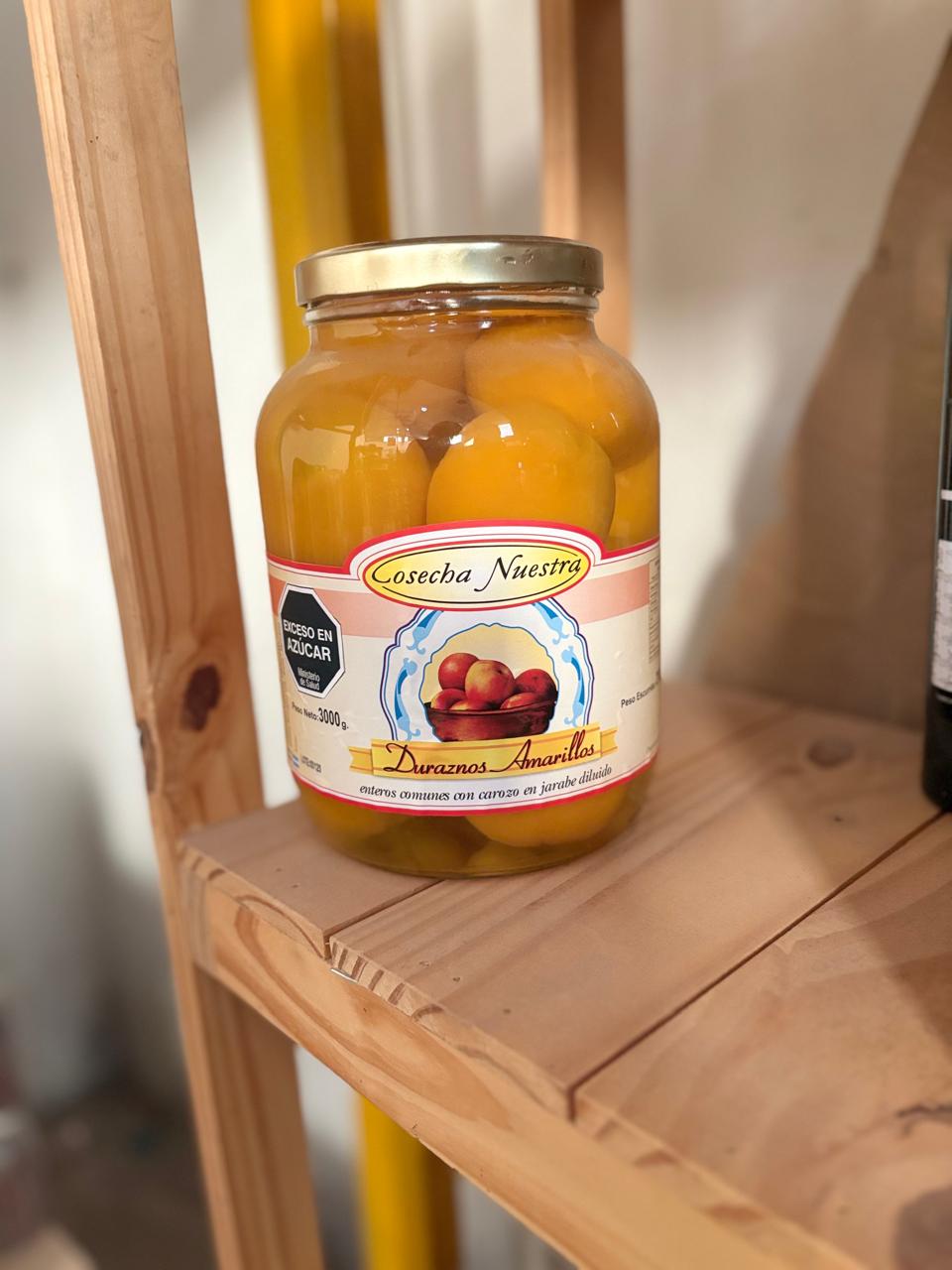 Duraznos amarillos enteros comunes con carozo 3kg